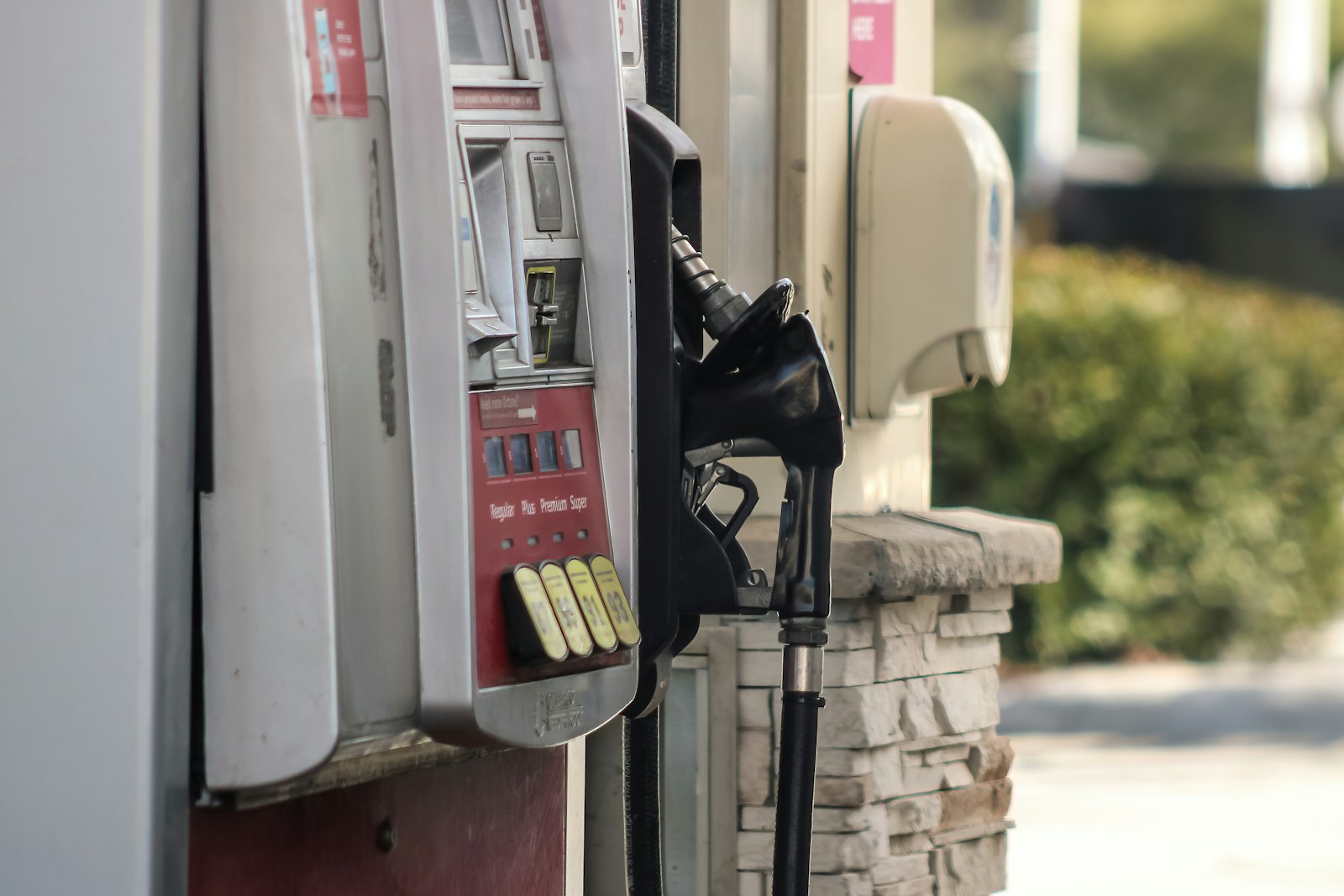 A fuel pump nozzle at a highway gas station