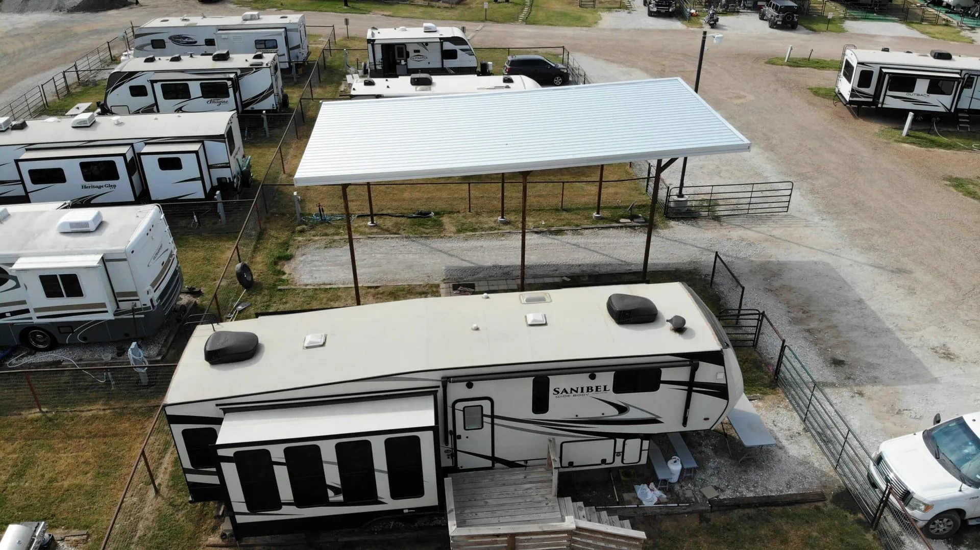 Side view of a covered RV site at Waggin' Tail Ranch RV Resort in North Texas