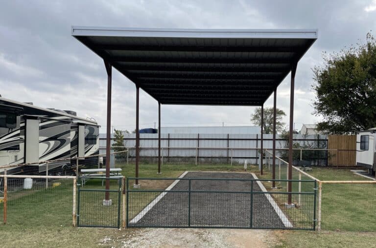 Image of covered, back-in RV space at Waggin' Tail RV Resort