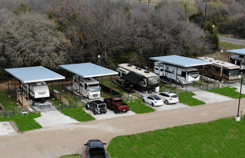 Image of Tree Lined Covered Fenced RV Sites at Waggin' Tail RV Resort